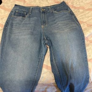 Never worn, blue jeans, stretchy, no rips